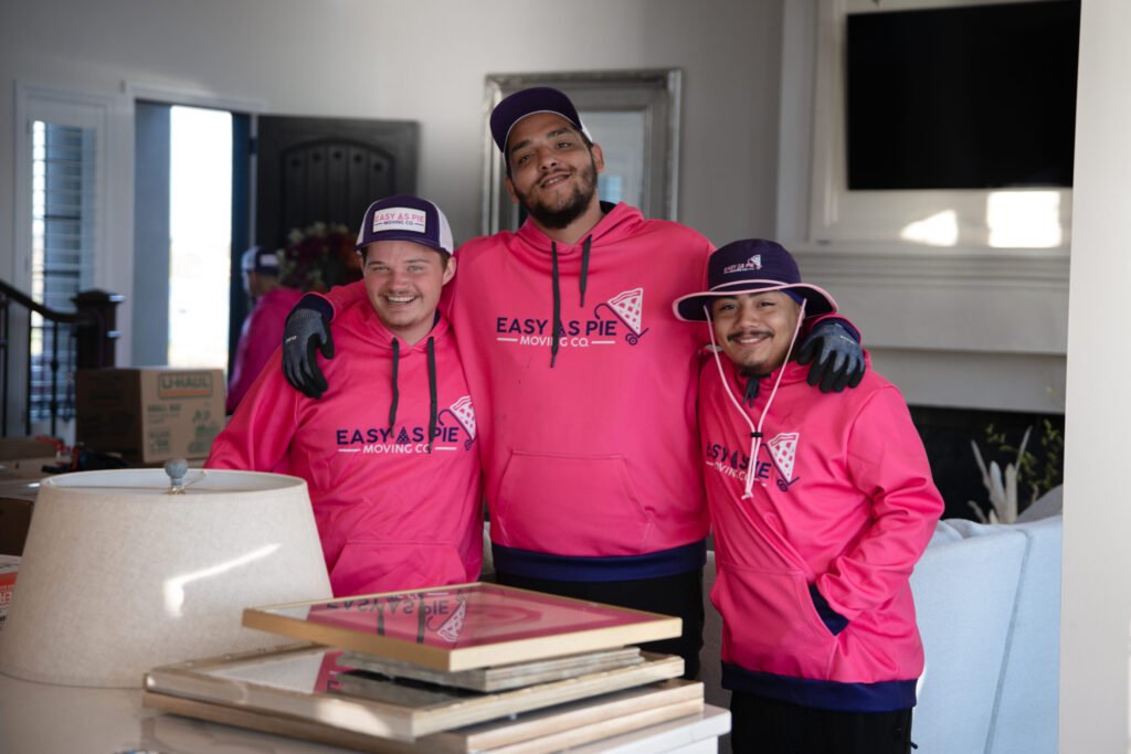 Three moving company easy as pie workers.