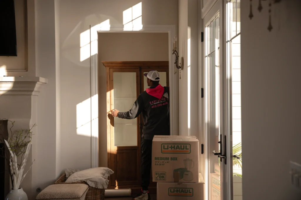Easy As Pie Moving team unloading furniture at a home in Papillion NE