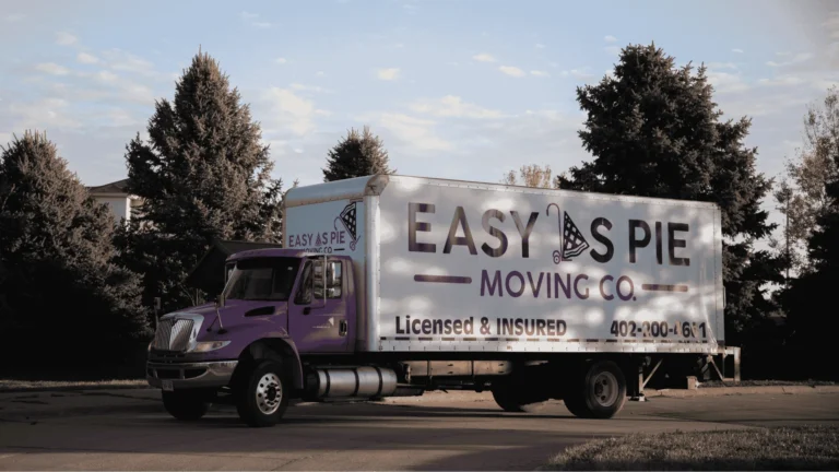 Easy As Pie Moving Co. truck on a neighborhood street