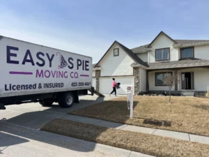 Easy As Pie Moving Co. truck parked in an Omaha neighborhood