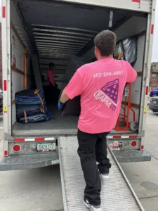 Easy As Pie mover walking up the ramp into a moving truck