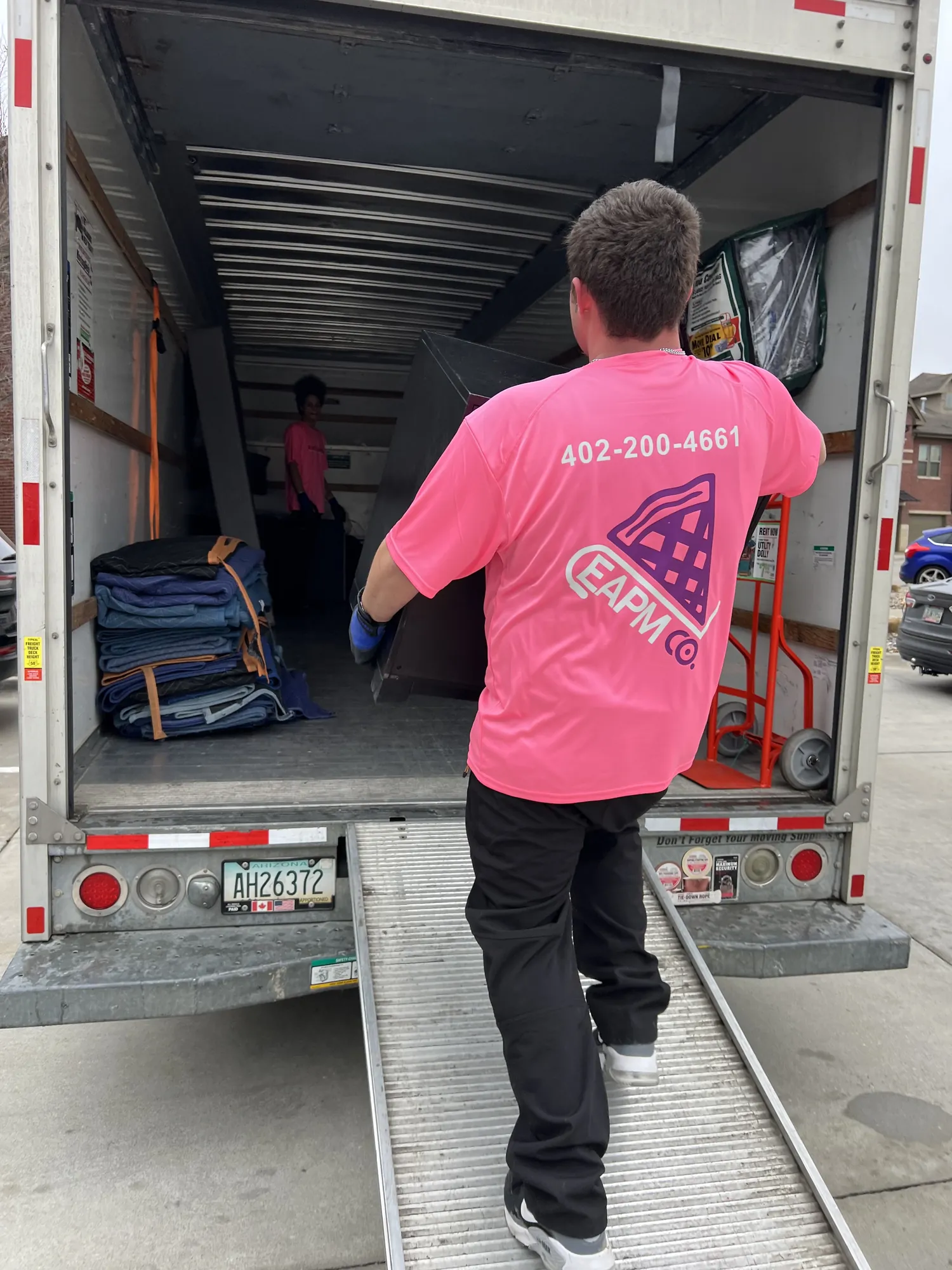 Easy As Pie mover walking up the ramp into a moving truck