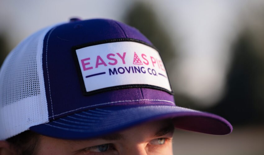 Easy as Pie Moving professional wearing company hat ready to provide winter moving tips Omaha residents trust